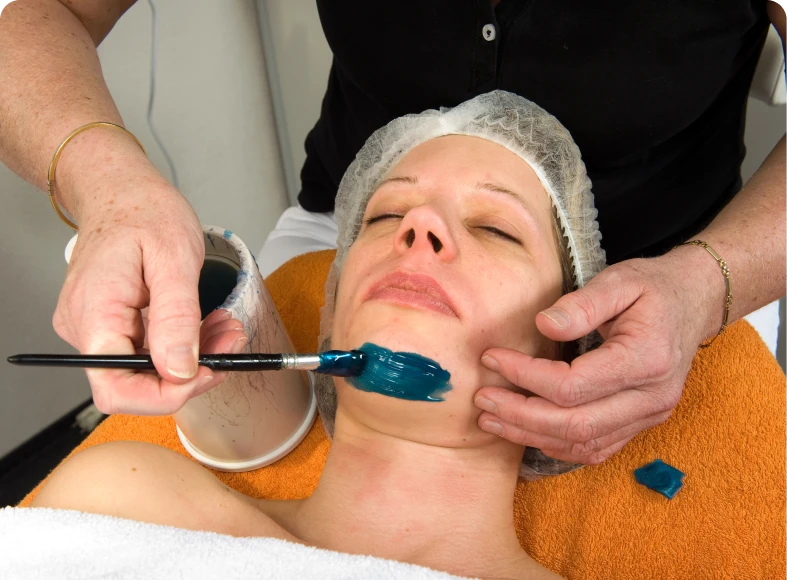 Woman receiving beauty treatment